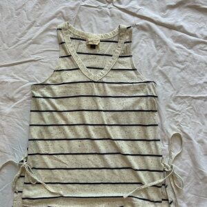 Super cute cream and navy blue tank with ties at the sides